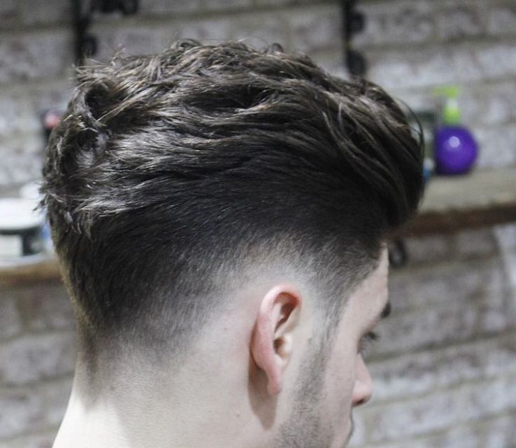 Casual Messy Brush Back with Disconnected Undercut Fade
