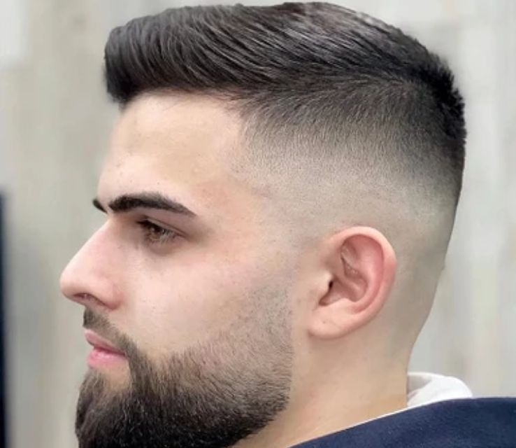 High Skin Fade + Hard Part Comb Over