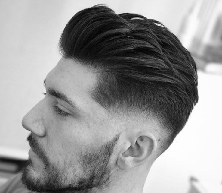 Low Skin Fade Haircut With Short Quiff on Top 