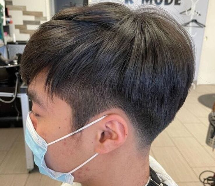 Two Block Hairstyle For Men With Round Faces